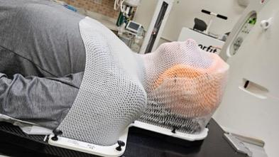 Patient with custom 3D printed radiotherapy bolus