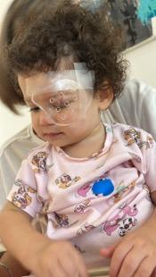 Romi wearing the protective device