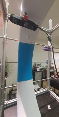 Scanner with limb positioned for capture